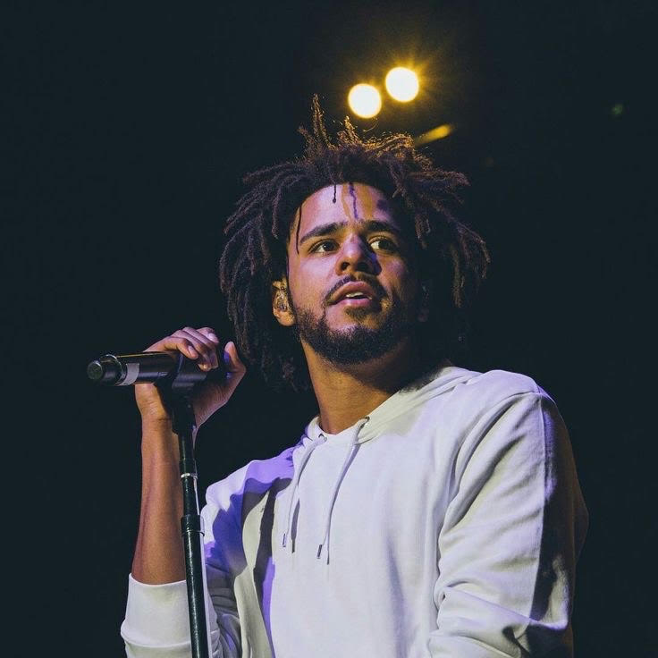 Image of Jermaine Cole with mic